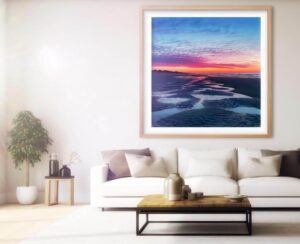 sunrise tidal pools on wall in fontina beach house - Carrie Stewart